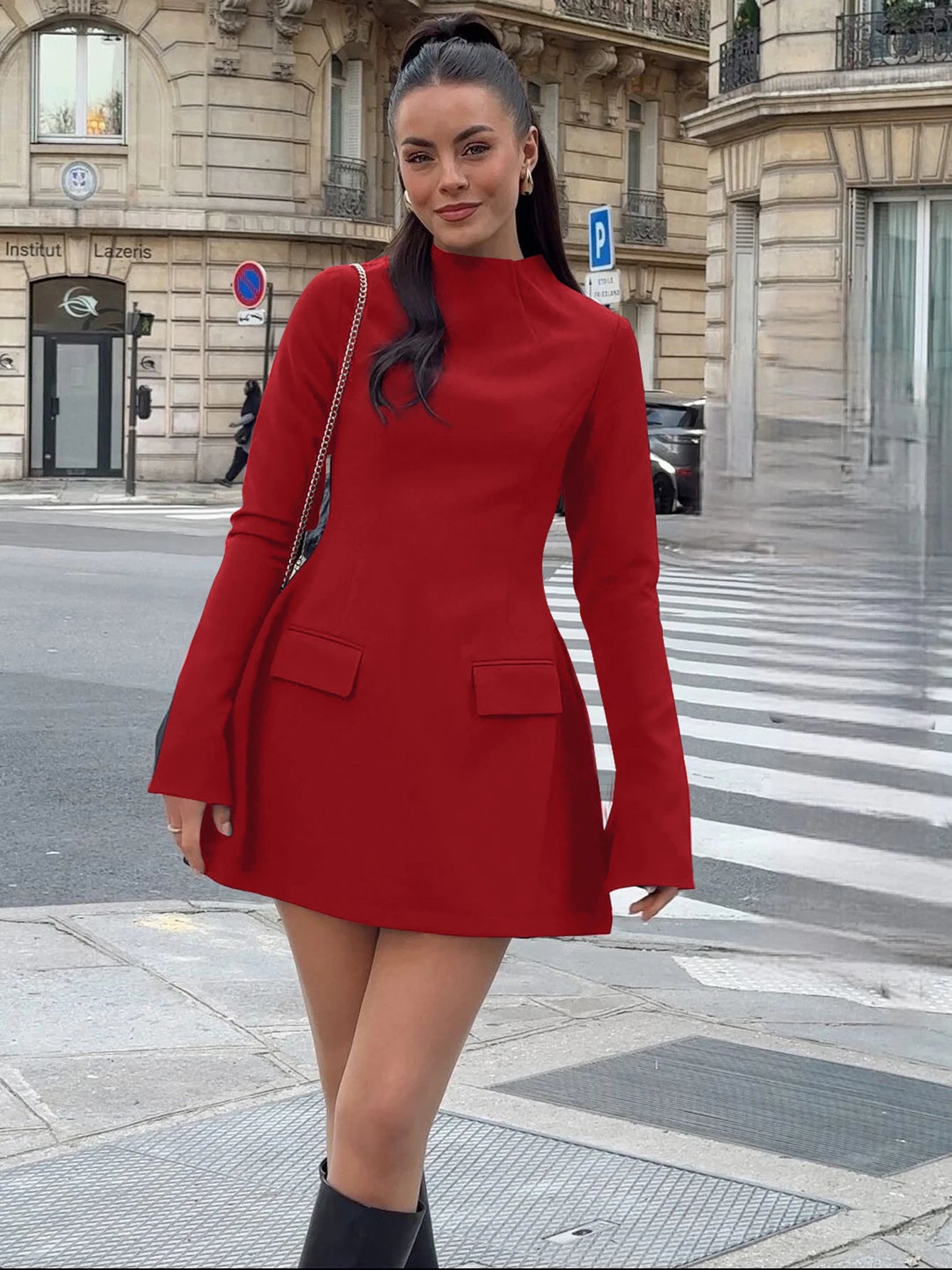 Long-sleeve bodycon mini dress with zipper and pockets.